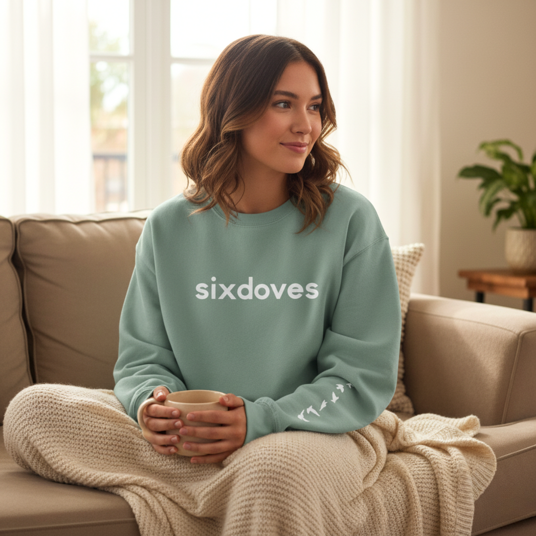 Gifts for cancer patients including a soft and cozy crewneck sweatshirt for treatment and recovery days and general support throughout the cancer journey. 