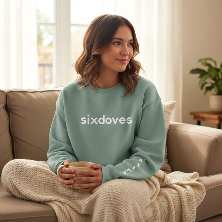 Gifts for cancer patients including a soft and cozy crewneck sweatshirt for treatment and recovery days and general support throughout the cancer journey. 