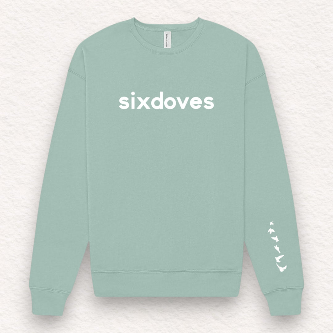 Gifts for cancer patients including a soft and cozy crewneck sweatshirt for treatment and recovery days and general support throughout the cancer journey. 