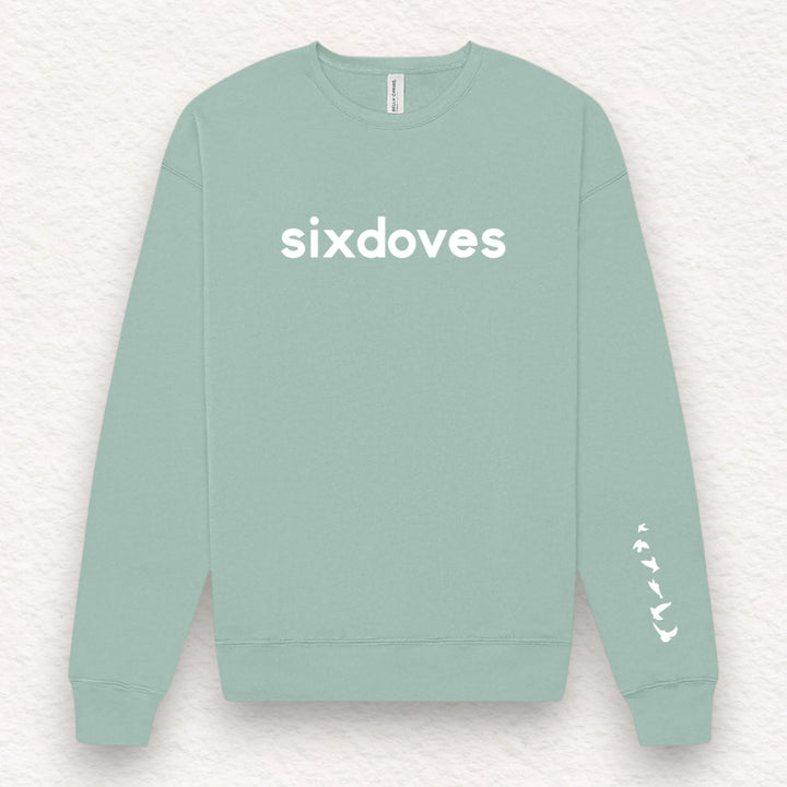 Gifts for cancer patients including a soft and cozy crewneck sweatshirt for treatment and recovery days and general support throughout the cancer journey. 