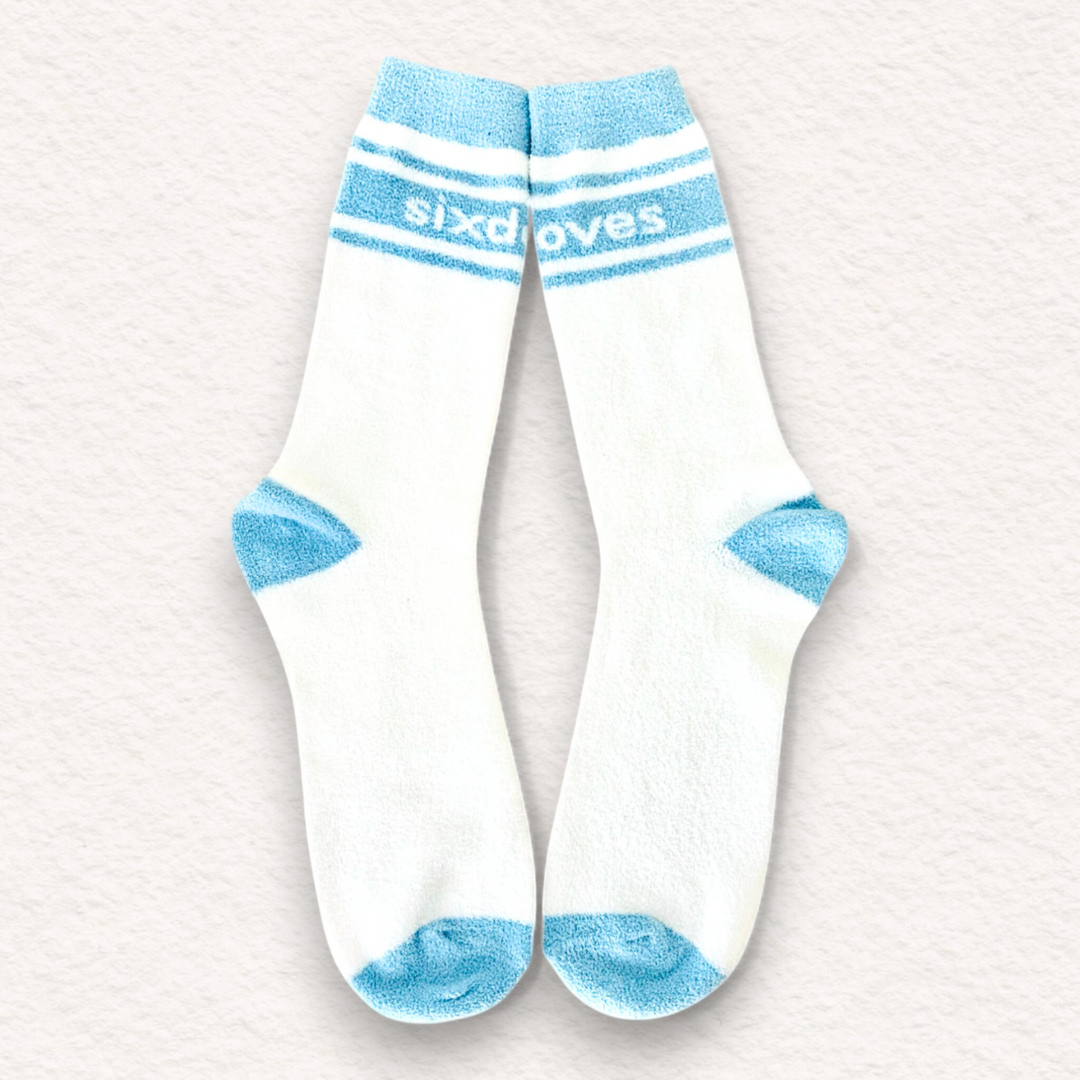 Gifts for cancer patients including fuzzy socks to provide comfort during cancer treatment. 