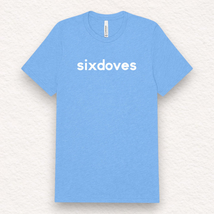 Gifts for cancer patients including a sixdoves Cancer Sucks t-shirt to show support and connection during a patient's cancer journey. 